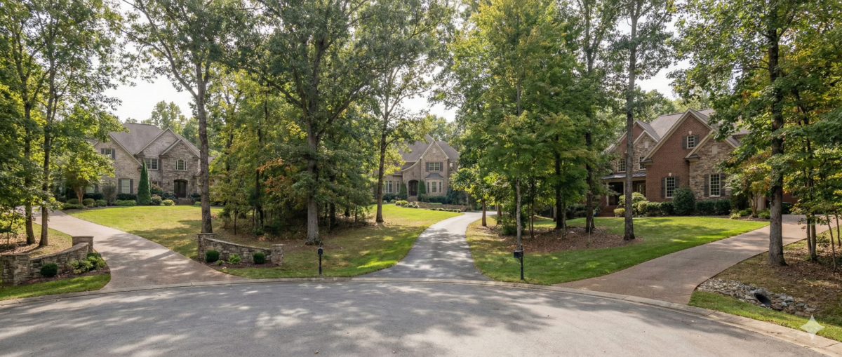 Living in Oak Hill Tennessee featuring estate homes, large wooded lots, and private residential living