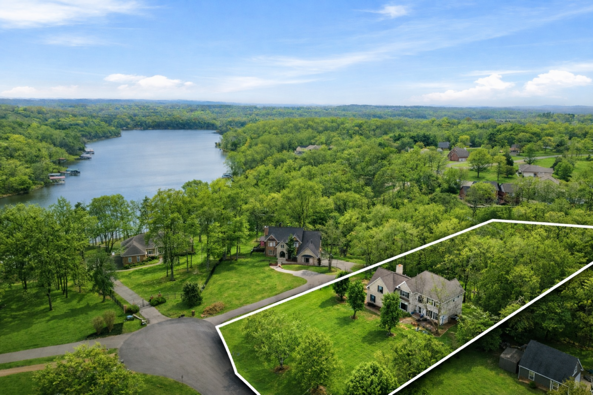 Aerial view of private home for sale in Gallatin TN near Old Hickory Lake with 1.3 acres, lush green yard, mature trees, and quiet cul-de-sac setting